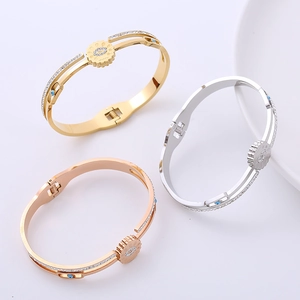 Three-color evil eye stainless steel spring rings with crystals in gold, silver and rose gold