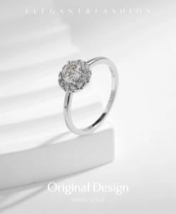 Detail of S925 sterling silver stamp and sparkling round moissanite on halo ring