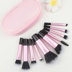 Macro detail of 10-piece makeup brush set with soft fiber bristles and travel case