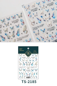 Macro view of blue butterfly embossed nail art stickers with 3D texture and gold accents