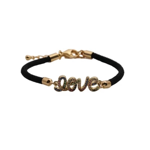 Detail of LOVE charm bracelet with colorful rhinestones on black braided cord strap