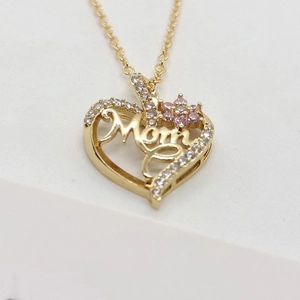 Golden heart necklace with MOM lettering and pink gem flower for Mother's Day gift