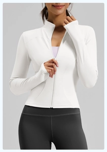 Close-up of white slim-fit sports jacket with thumbholes and smooth zipper detail