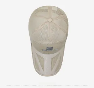 Top view of beige mesh sports hat featuring breathable fabric and embroidered logo