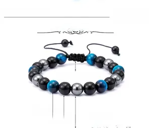 Detail of 8mm blue tiger eye and obsidian beaded bracelet with adjustable cord specifications