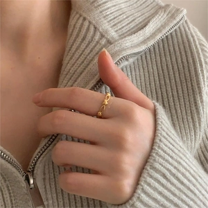 Elegant 925 sterling silver woven link ring in polished gold finish for women