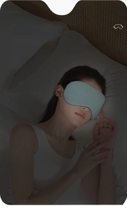 Detail of adjustable sleep mask with pressure-free shading on a model in bedroom