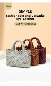 Close-up of hand-woven leather tote bags in grey, brown, and burgundy textured finish