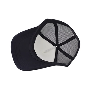 Detail view showing breathable black mesh structure and inner foam support of the baseball cap