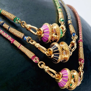 Bohemian twisted braid necklace with 18K gold-plated vintage embossed enamel pendants