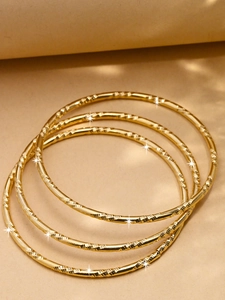 Ensemble de 3 joncs fins dorés de 3mm avec gravures texturées élégantes et brillantes