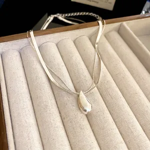 Double-layered silver waterdrop necklace with snake chain and polished pendant charm
