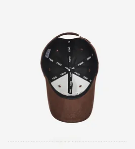 Detail view of the brown baseball cap interior featuring FBKS logo printed lining tape