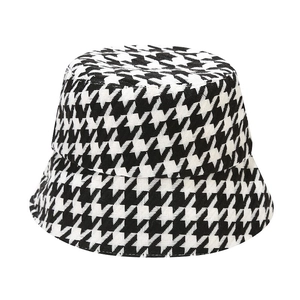 Classic black and white houndstooth bucket hat with thick woven texture for winter