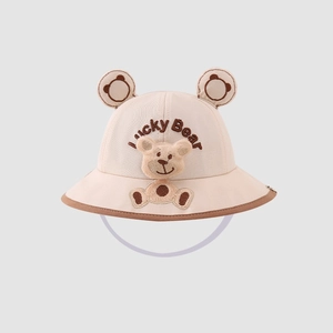 Detail of baby sun hat with 3D bear ears and Lucky Bear embroidery in beige