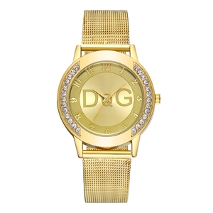 Elegant gold ladies mesh strap quartz watch featuring a sparkling rhinestone bezel