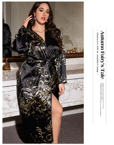 Detailed view of luxury black satin floral bathrobe with elegant waist belt and printing