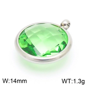 Detailed macro view of 14mm silver birthstone pendant with faceted green crystal and specs
