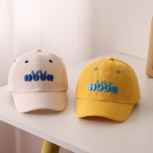 Set of two cotton baseball caps for kids with MOON bunny embroidery in beige and yellow