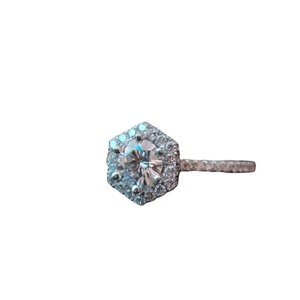 Moissanite halo engagement ring with white gold finish and round brilliant cut stone