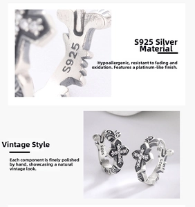 Macro shot of S925 sterling silver stamp on vintage gothic cross earrings with pave stones