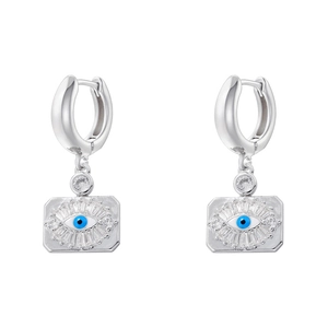 Macro shot of silver evil eye stud earrings with blue and clear crystal inlay