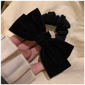 Handmade black velvet scrunchie with large bow detail in vintage French style