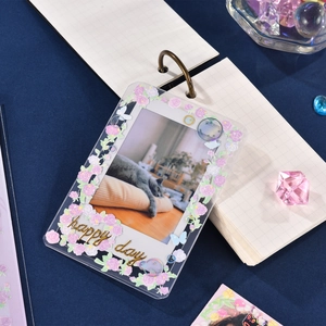 Pink and purple flower decorated transparent photo card holder with happy day stickers