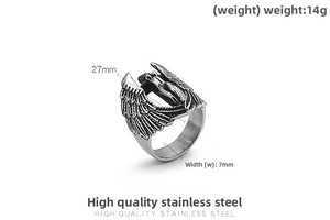 Detail shot of vintage stainless steel angel wing ring showing 27mm height and 7mm width