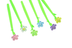 Macro detail of silicone gel pens featuring colorful flowers and green leaf designs