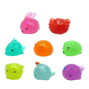 Set of 8 colorful glitter animal squishy stress relief toys including bunny and crab