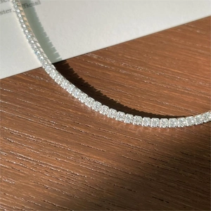 Classic 925 sterling silver tennis necklace with sparkling zircon pavé in a close-up view