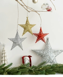 Hanging gold and silver metal star ornaments with glitter finish for Christmas decor