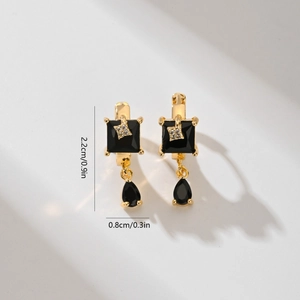 Elegant gold earrings with black gemstones and small diamonds, 2.2cm x 0.8cm size