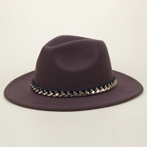 Close-up of a purple wool fedora with a chunky gold chain and blue ribbon detail
