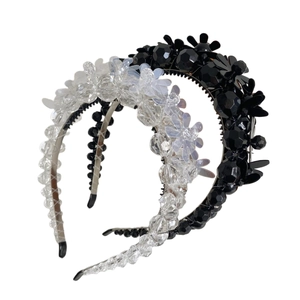 Elegant beaded flower headband with crystal pearls and non-slip design in white and black