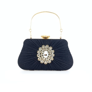 Elegant black pleated satin evening clutch bag with sparkling rhinestone flower and gold handle