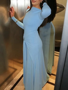 Slim fit light blue long sleeve maxi dress with waist pleats and floor length hem