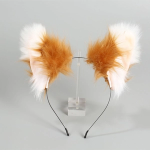 Detail view of handmade brown and white plush fox ears on a slim black metal headband