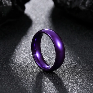 Macro view of 6mm purple plated stainless steel ring with high polished smooth surface