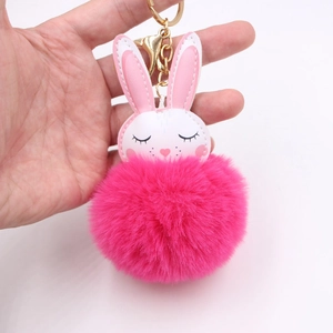 Portachiavi con coniglio di peluche bianco e rosa e pompon rosa per borse da donna