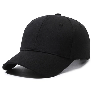 Classic black cotton baseball cap in minimalist six-panel style, side profile view