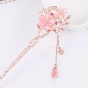 Elegant rose gold flower hair pin with pink floral charms and dangling tassel gemstone