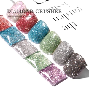 Diamond crush glitter nail polish swatches in silver red and blue for salon manicure