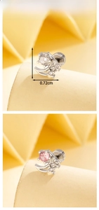 Detail showing moon and star cartilage earrings with cubic zirconia, size 0.72cm x 0.67cm