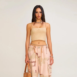 Sleeveless cropped sports vest in faded khaki with camouflage cargo pants for women