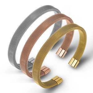 Detailed view of mesh cuff bracelets in silver, gold, and rose gold stainless steel