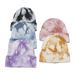 Five assorted tie-dye knitted beanies for women in grey blue purple pink and orange colors