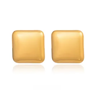 Close-up of polished 18K gold plated stainless steel square stud earrings with mirror finish