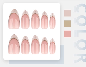 Detailed chart of long almond press-on nails with nude pink base and gold French tips